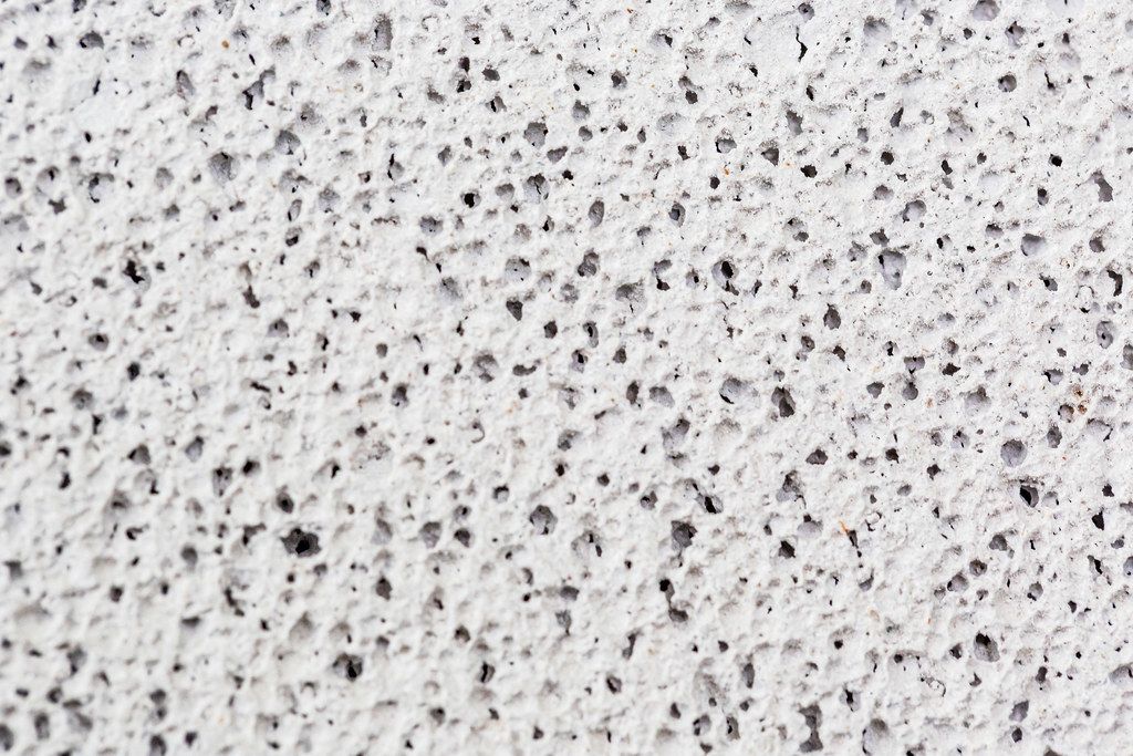Pumice stone background. Gray pumice for the care of rough skin
