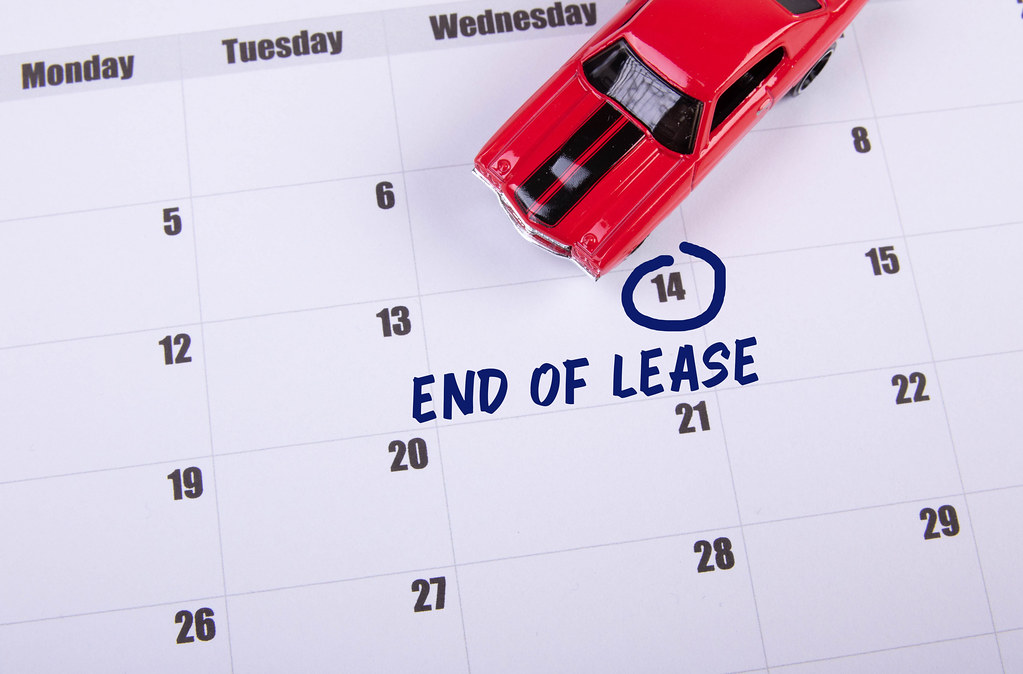Red toy car and End of Lease text on the calendar