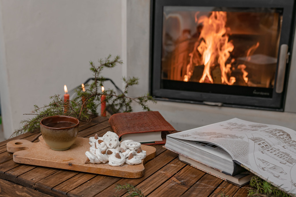 Romantic Winter Hygge Mood With Fireplace And Tea