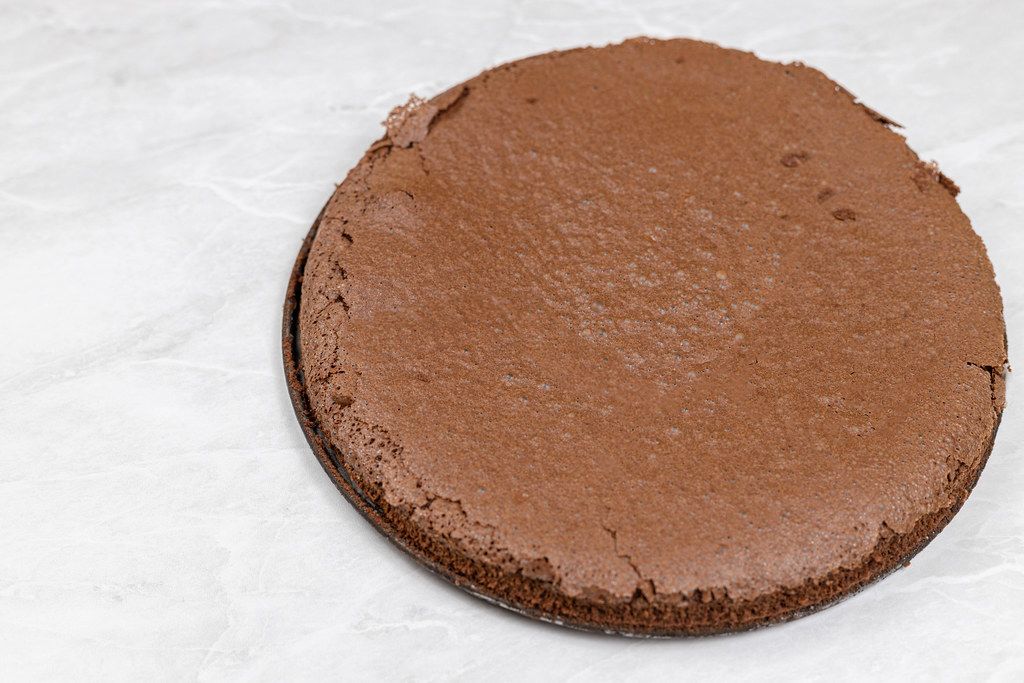 Round Chocolate cake on the table with copy space