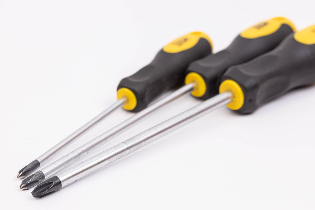 Screwdrivers above white background
