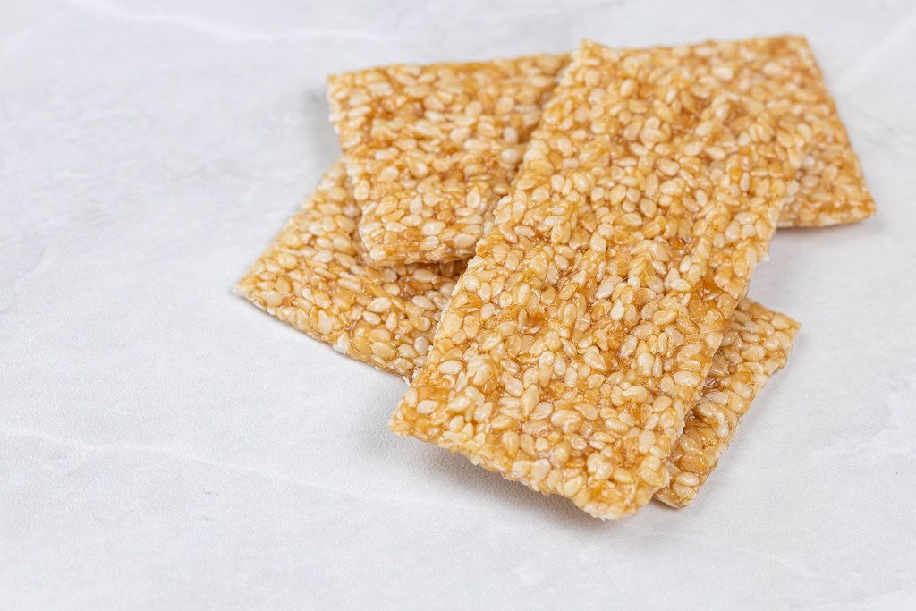 Sesame Bars pile on the grey marble table