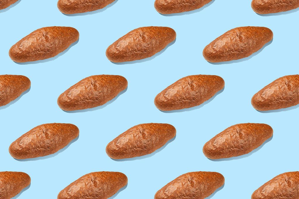 Set of healthy bread on bright blue background
