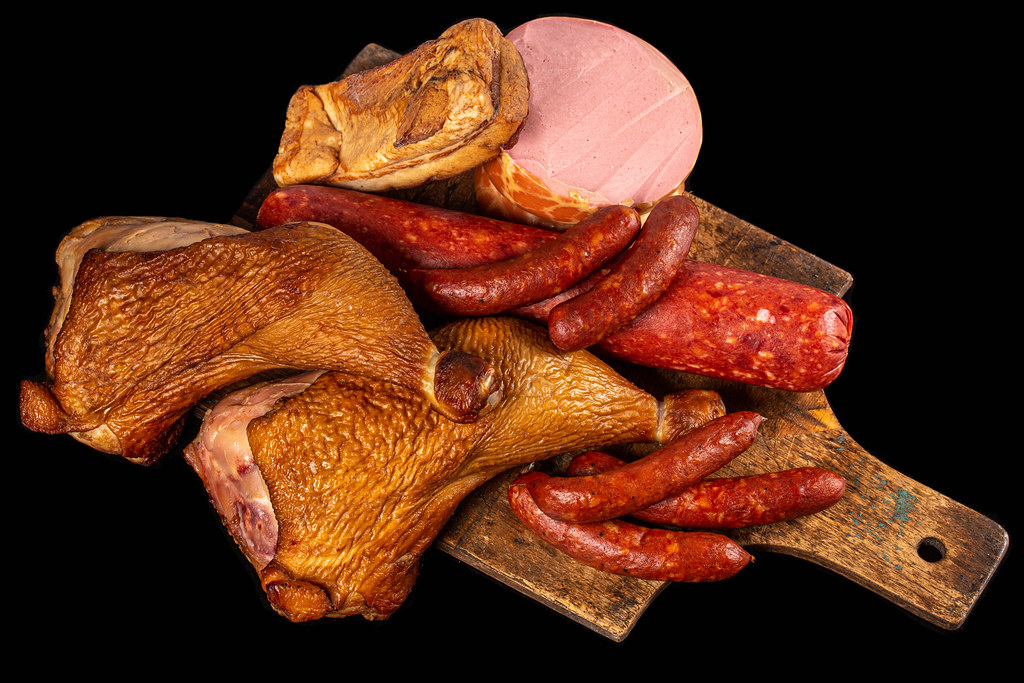 Set of smoked salami, chicken legs, lard and sausage