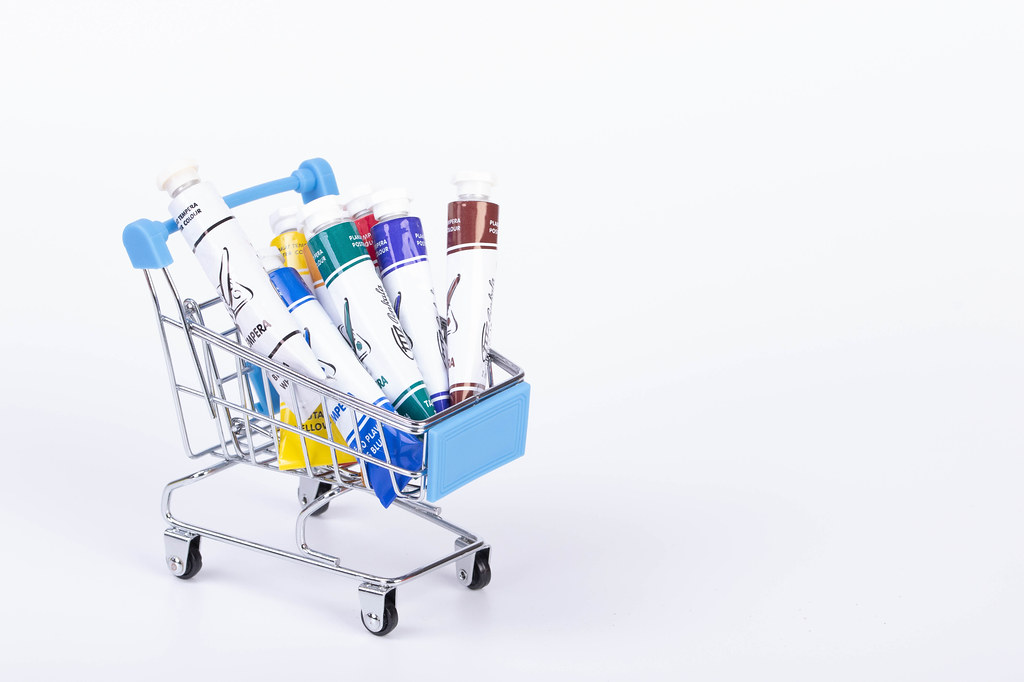 Shopping cart full of painting colors