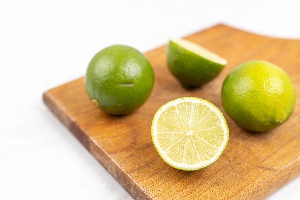 Sliced Lime on the wooden cutting board