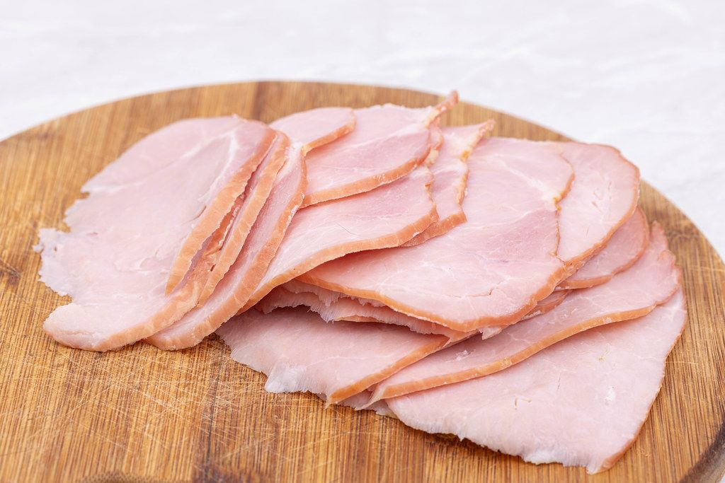 Sliced Smoked Ham on the wooden board