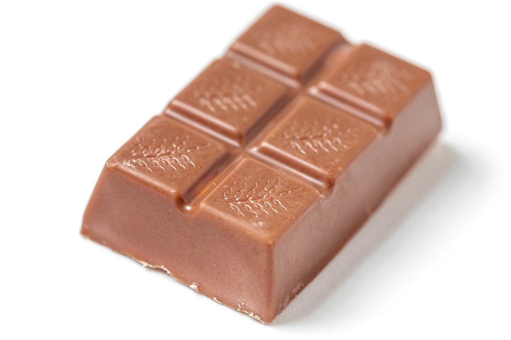 Small milk candy chocolate bar, close-up