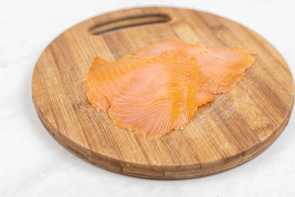 Smoked Salmon filet on the wooden board