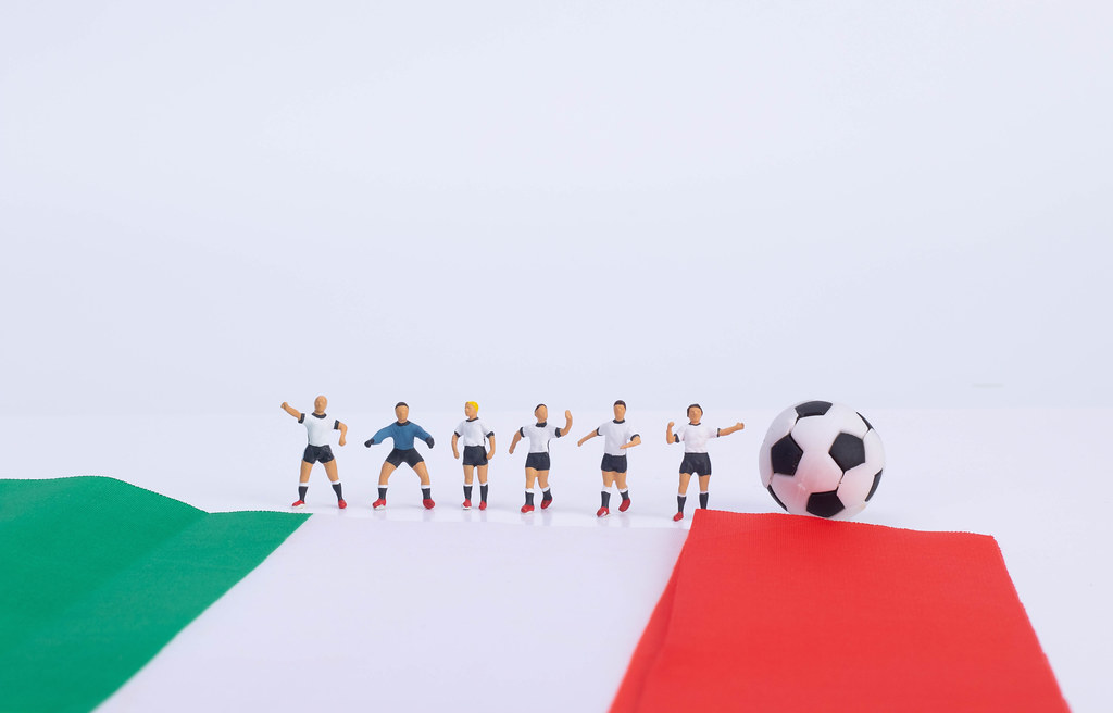 Soccer players with flag of Italy