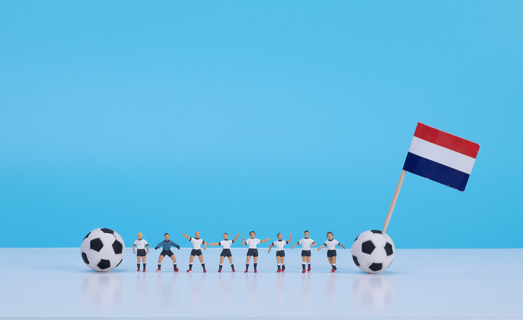 Soccer players with flag of Netherlands