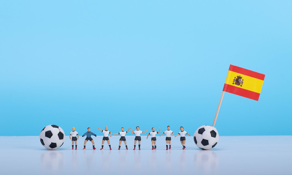 Soccer players with flag of Spain