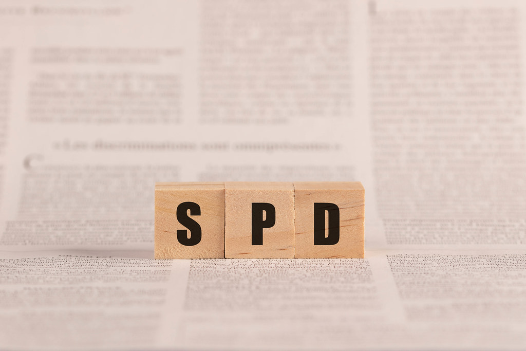 SPD written with cubes on a newspaper