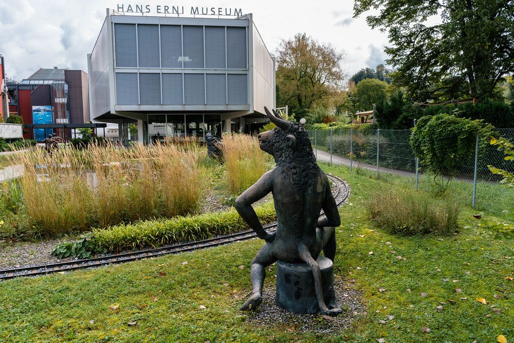 Statue of a sitting bull in front of Hans Erni museum in Lucern, Switzerland