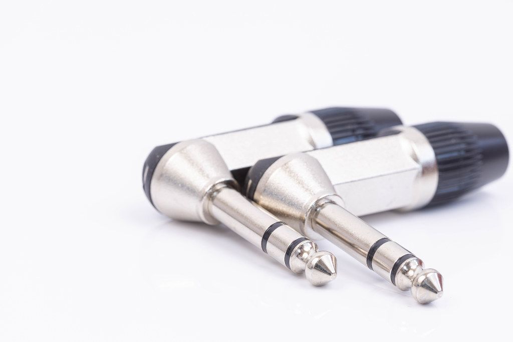 Stereo Jack connectors 1/4 isolated above white background