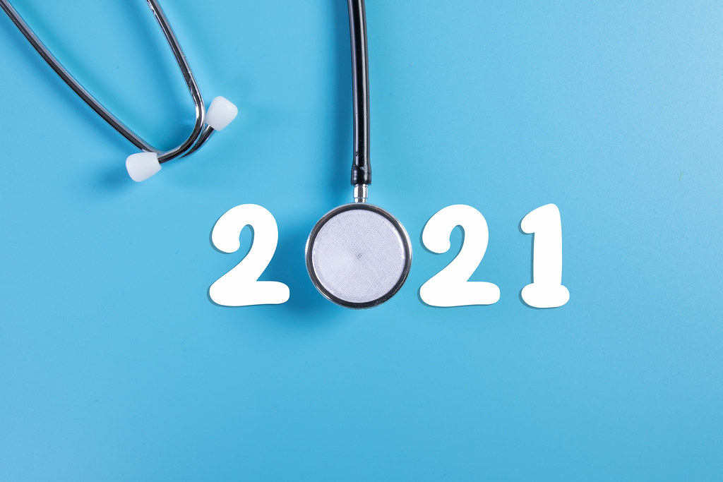 Stethoscope with 2021 text on blue background