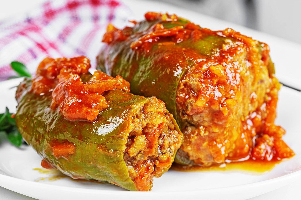 Stuffed peppers with vegetables, meat and tomato sauce