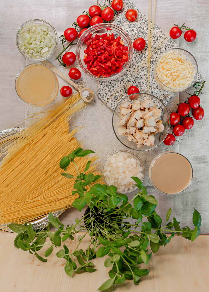 Table Flatlay Set With Chicken Spagetti Ingredients Recipe