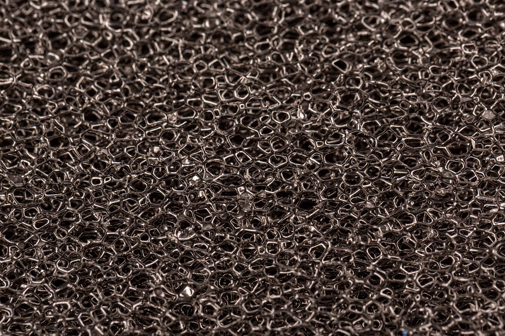 Texture of black sponge - finely dispersed filter element for aquarium filter, close up
