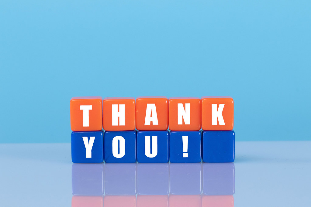 Thank you! text with orange and blue cubes