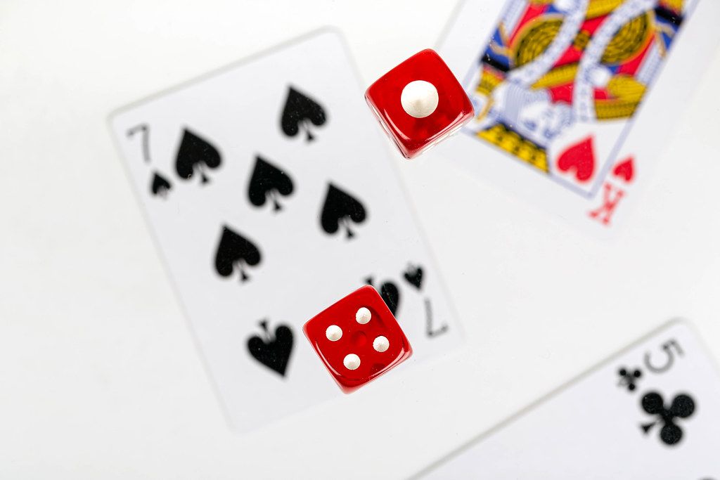 The concept of gambling and luck. Dice and cards