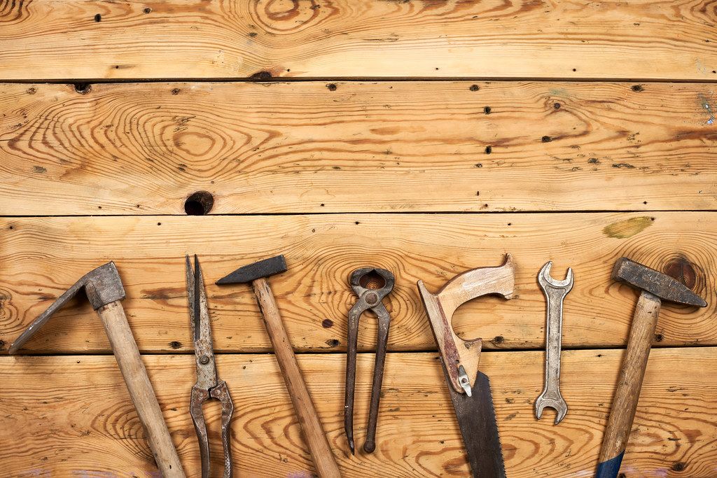 Tools on wooden background with copy space