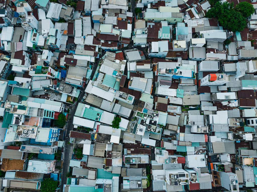 Top View Drone Photo of Buildings, Alleys and Trees in a Local Residential Area in District 4 in Ho Chi Minh City, Vietnam