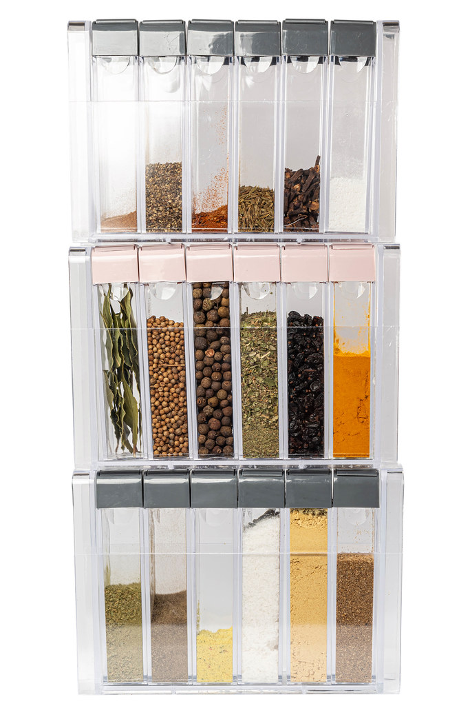 Transparent containers for spices with a variety of colorful spices