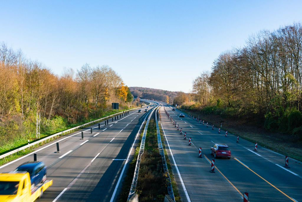 Truck and passenger cars on the German autobahn 1