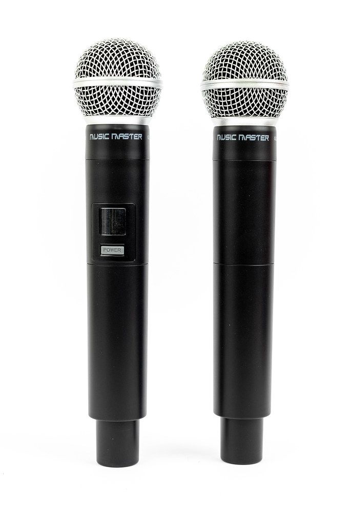 Two Vocal Microphones standing above white background