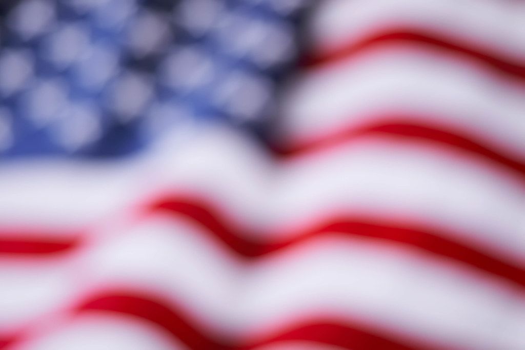 Unfocused image of USA flag for background usage