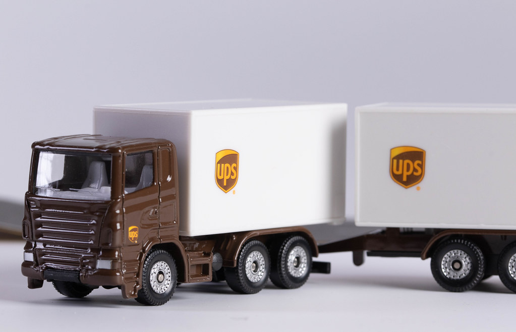 UPS delivery truck with white background