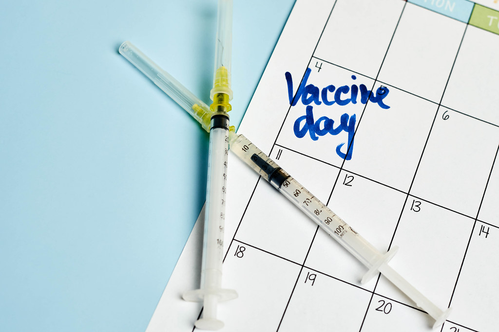 Vaccine day written on the calendar date