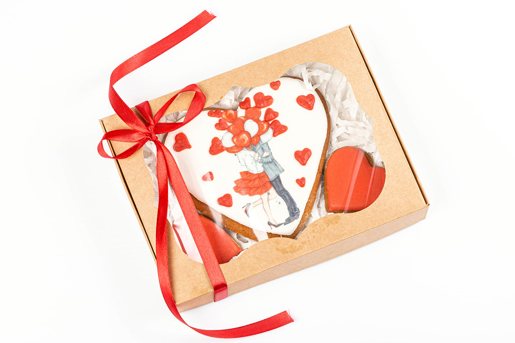 Valentine's day greeting card with heart shaped cookies in gift box