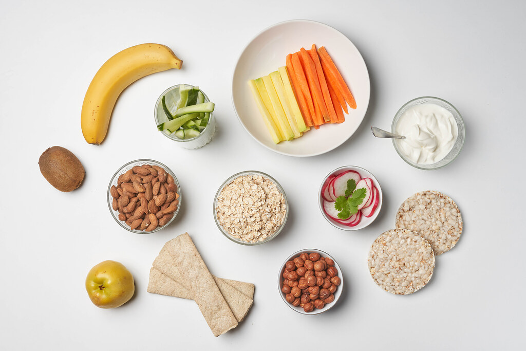 Various healthy snacks on the white background.