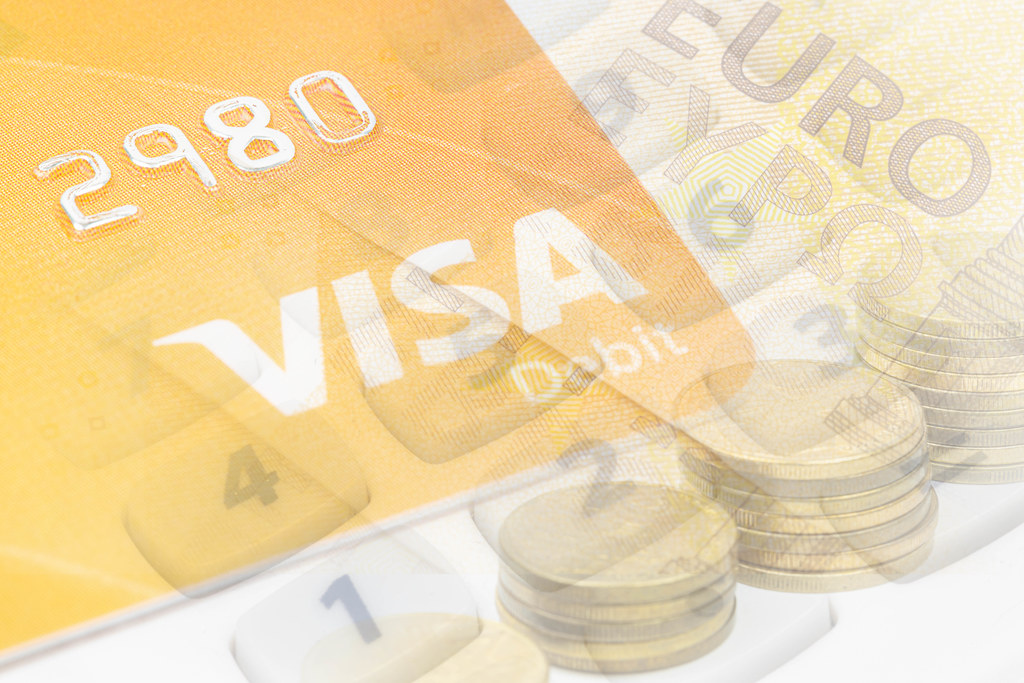 Visa credit card concept with Euro currency in the background