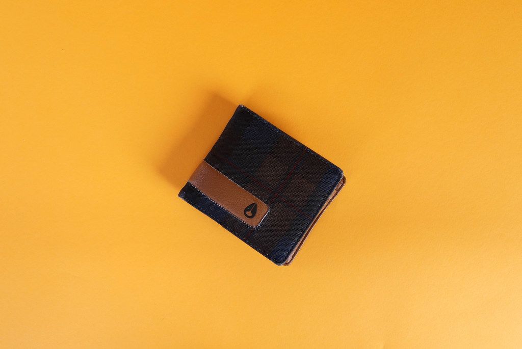 Wallet on orange background