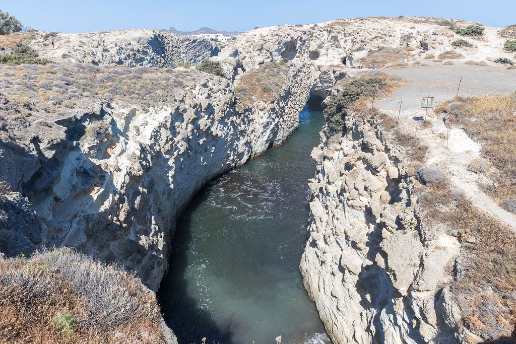 Waters flowing between the rocks. Breathtaking landscape with no people in Papafrangas, Milos