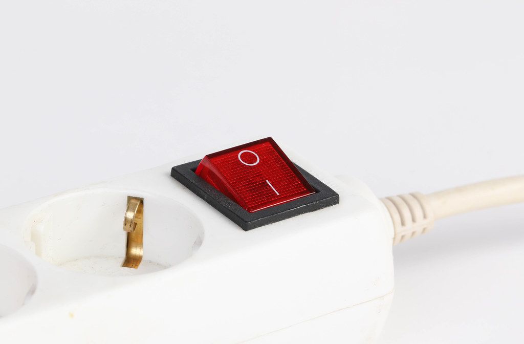 White electric splitter with red switch