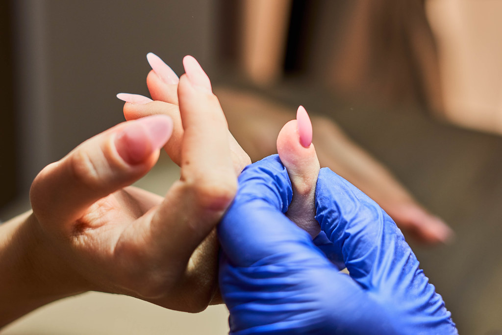 Woman hands during manicure procedure