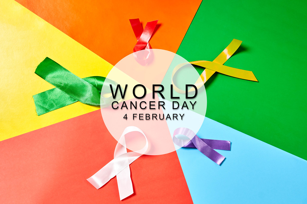 World cancer day and colored ribbons as symbols of different cancer disease types