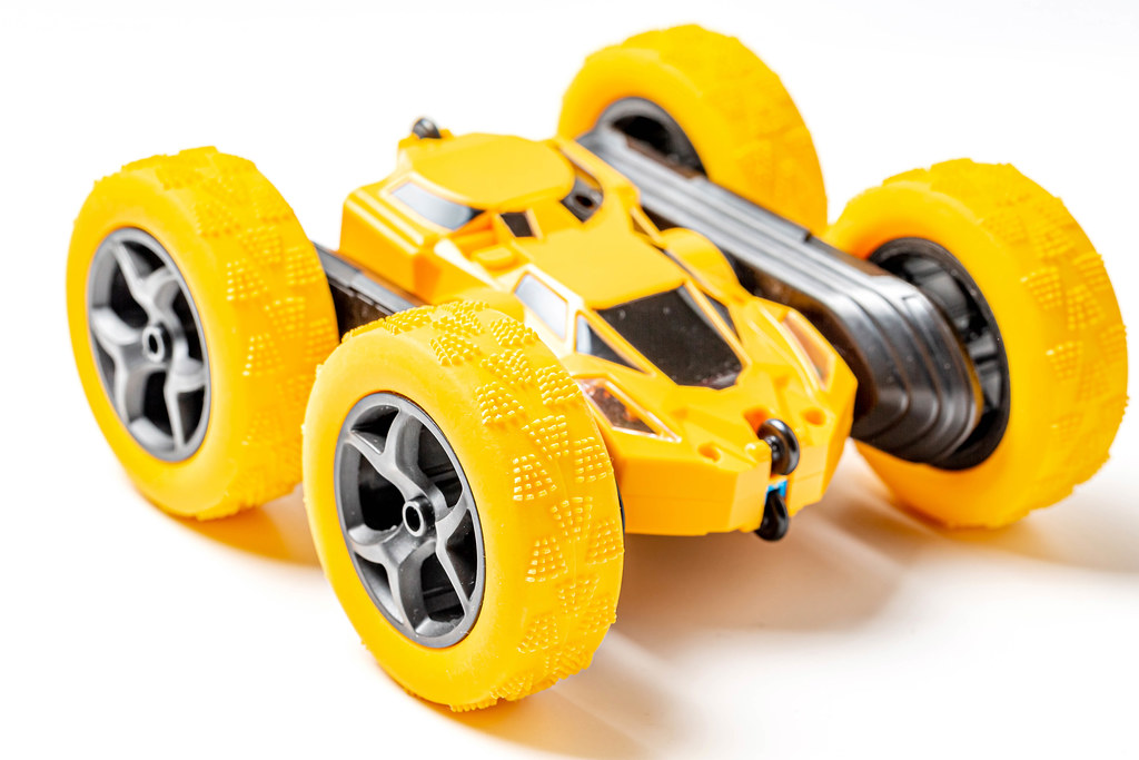 Yellow toy radio-controlled car-shifter, close-up