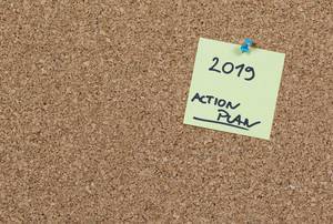 2019 action plan written on sticky note