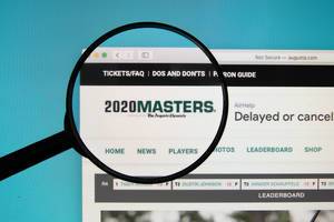 2020 Masters text on a computer screen with a magnifying glass