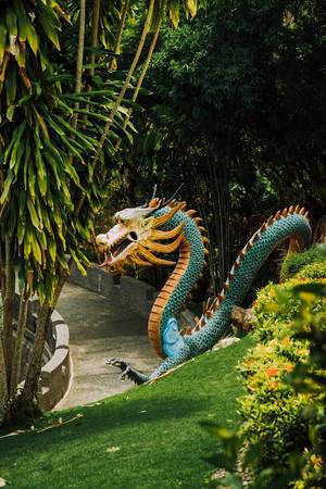 A large dragon statue in a temple (Flip 2019)