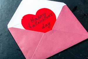 A letter with a red Valentine inside