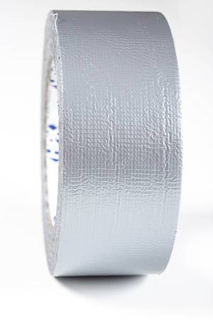 A roll of gray adhesive tape close-up