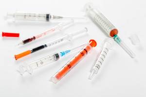 A set of different syringes for injection and oral administration of medicines