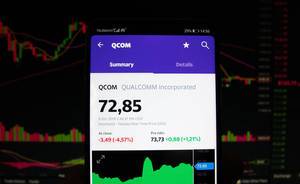 A smartphone displays the QUALCOMM Incorporated market value