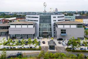 Aerial photo shot with the drone DJI Mavic Pro 2, showing Mercedes-Benz branch in Cologne and a large Mercedes star on the roof